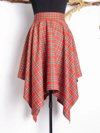 Bonnie Skirt in red tartan plaid with asymmetrical handkerchief hem – high-waisted vintage-inspired design – part of a hero mobile section on Cori Tailor's homepage.