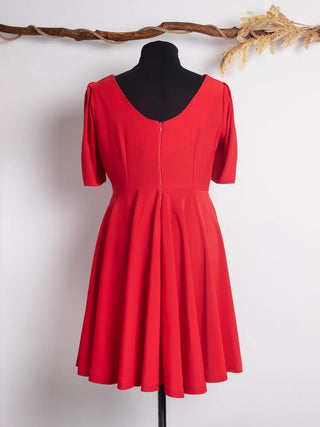Back view of the Sophia Dress in bold red, featuring a scooped neckline, invisible zipper, and fitted waist. Handmade 1950s-inspired design by Cori Tailor.